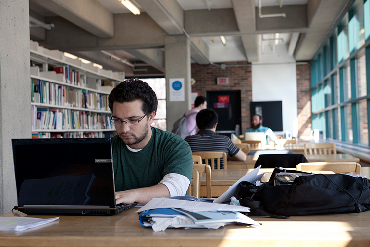 Student studying at the Vanier Library