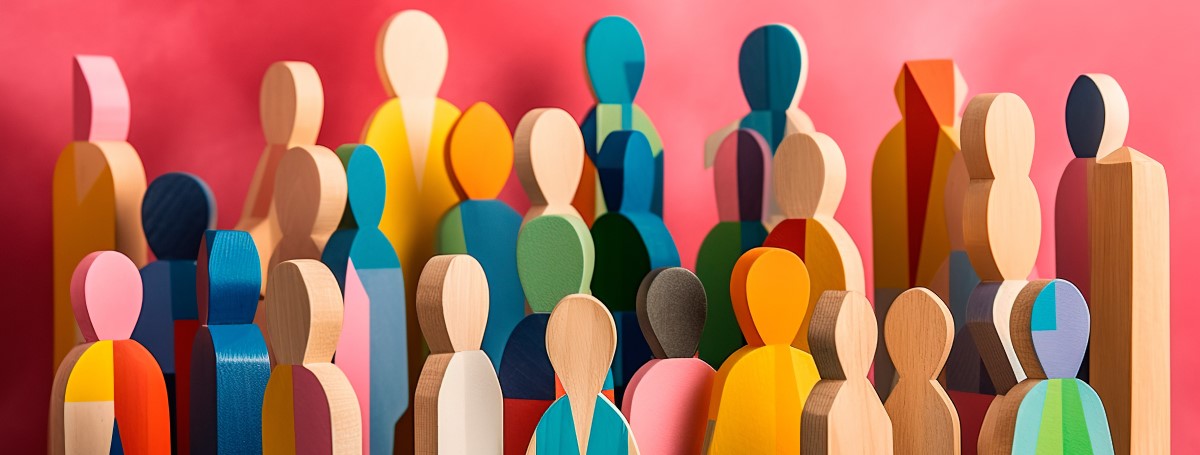 A cartoon of human silhouettes of different sizes and colors over a peach background. 