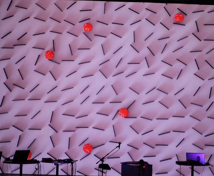 artistic background with laptops on tables with microphones and sound equipment in foreground