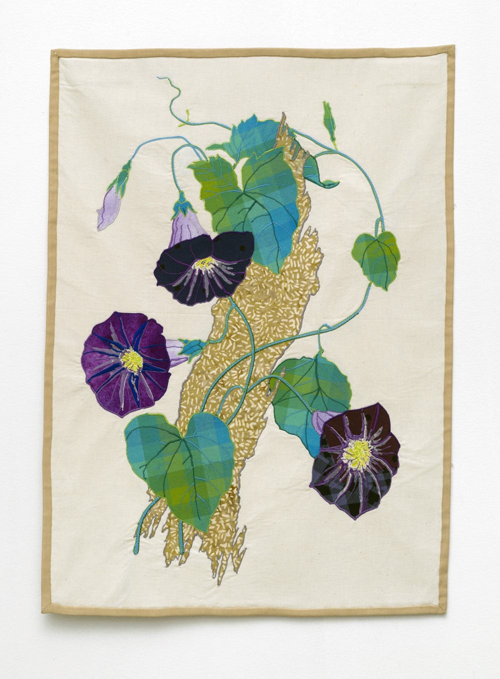 Tapestry with green and blue vine and three purple flowers