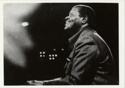 Oscar Peterson playing piano